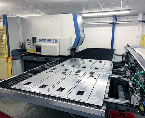 Multiple enclosure parts punched from one sheet