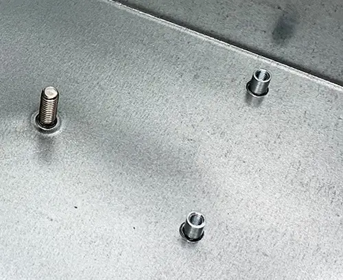 An M4 flush head fixing stud and two M3 blind standoffs fitted.