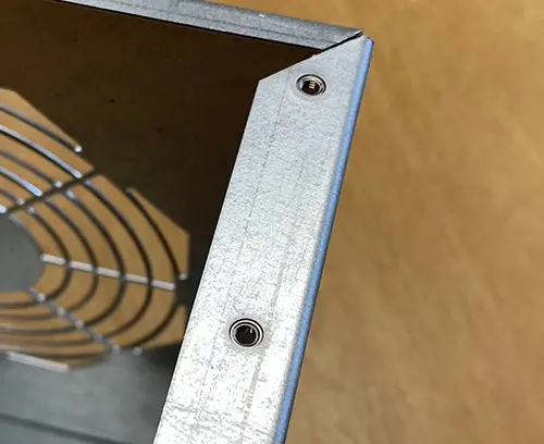 M3 self-clinch nuts (front face) fitted to panel.